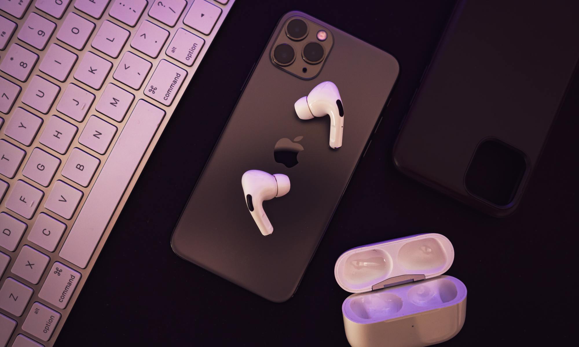 A picture of the iPhone 11 Pro Max with the AirPods Pro.